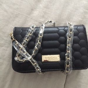 Bebe black clutch